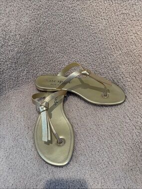 kate spade Metallic Gold Leather Tassel Thong Sandals